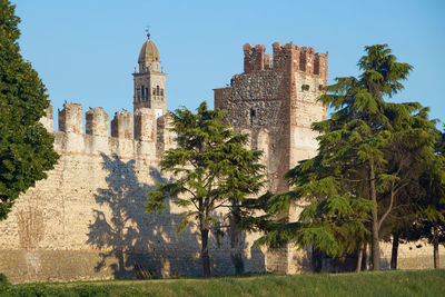 Low angle view of historic building against sky