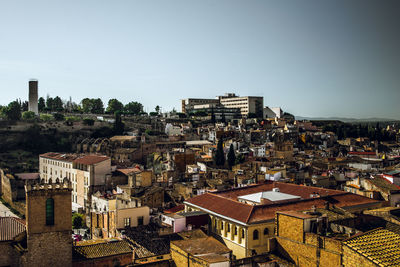 High angle shot of townscape against clear sky
