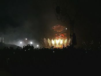 Firework display at night