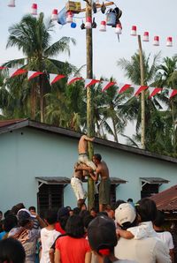 Group of people in front of built structure