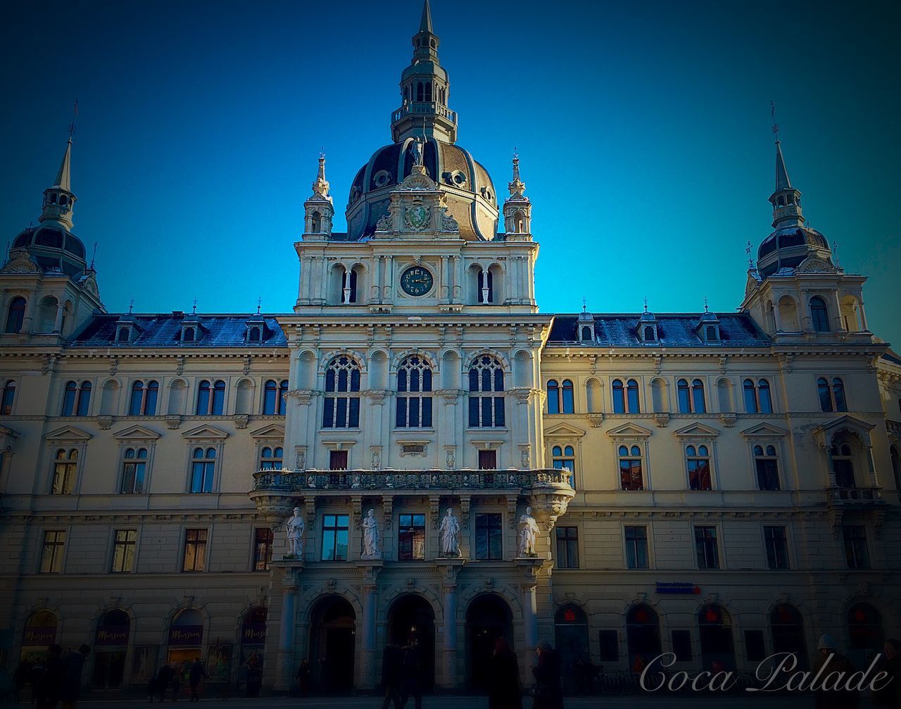 architecture, building exterior, built structure, clear sky, low angle view, religion, travel destinations, church, place of worship, famous place, cathedral, tourism, facade, blue, travel, spirituality, city, history