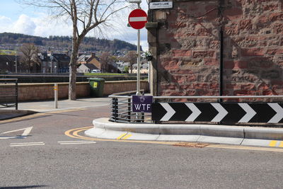 Road sign on street in city