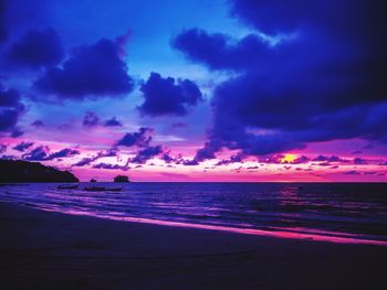 Scenic view of sea against dramatic sky