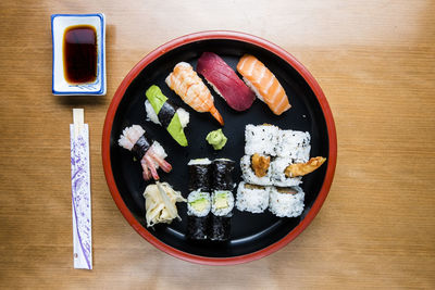 High angle view of sushi served on table