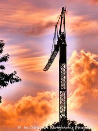 Silhouette of building at sunset