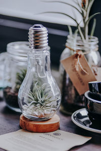 Close-up of glass jar on table