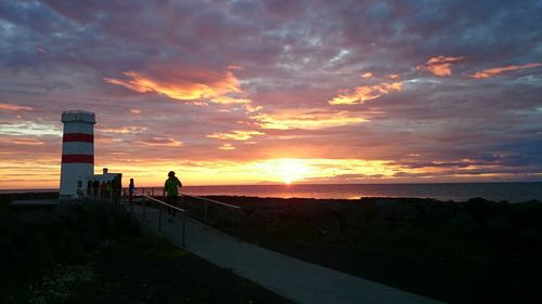 Scenic view of sea against cloudy sky