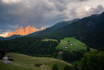 Scenic view of landscape and mountains against sky