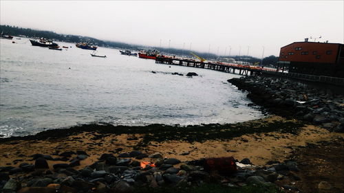 View of calm beach against sky