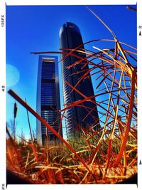 Low angle view of built structure against blue sky