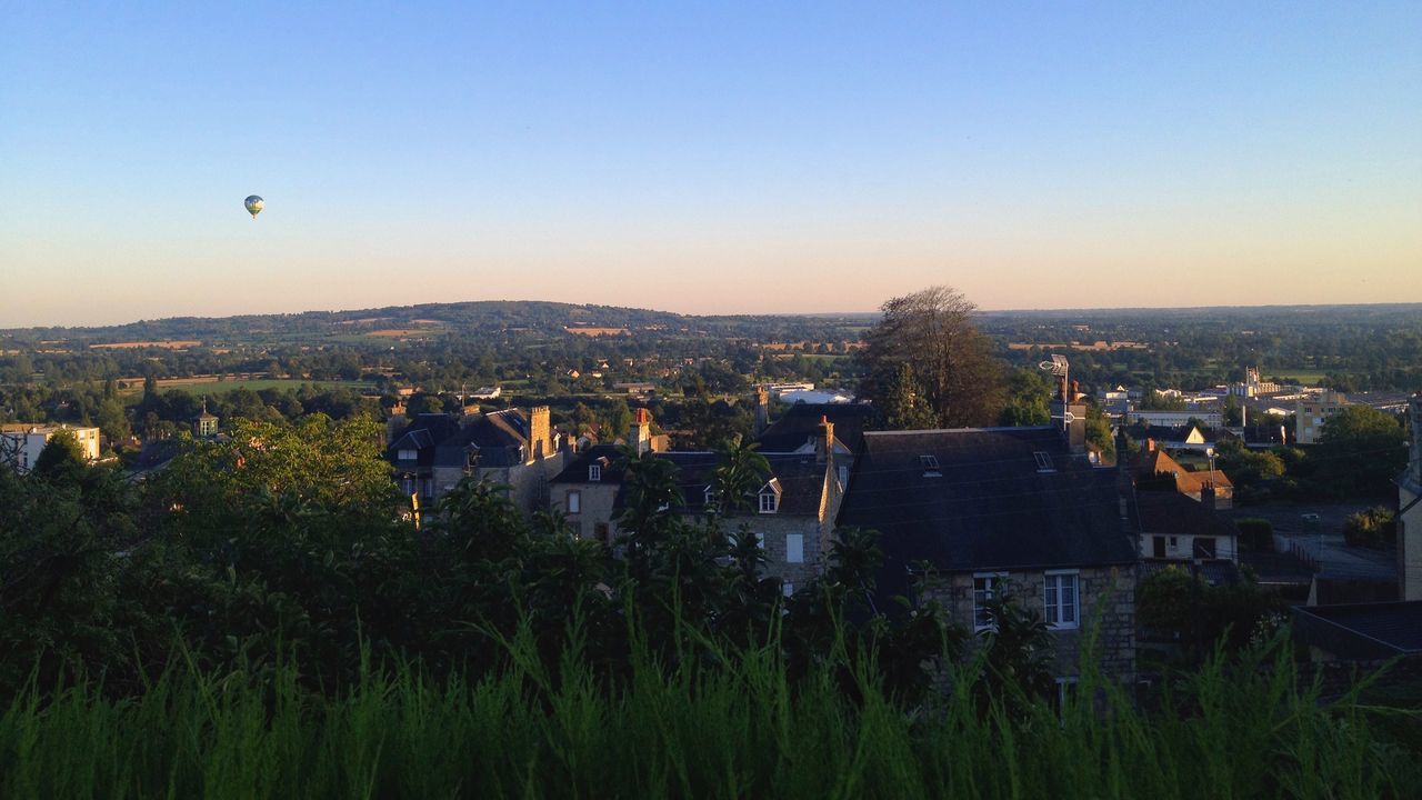 PANORAMIC SHOT OF BUILDINGS AGAINST SKY