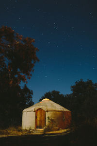 House against sky at night