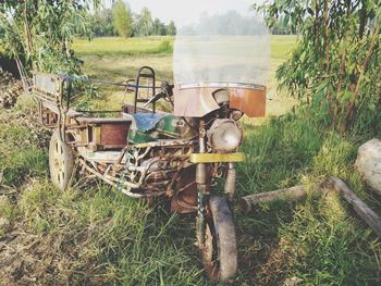Abandoned truck on field