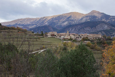 Scenic view of landscape and mountains against sky