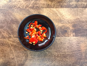 High angle view of chopped vegetables in bowl on table