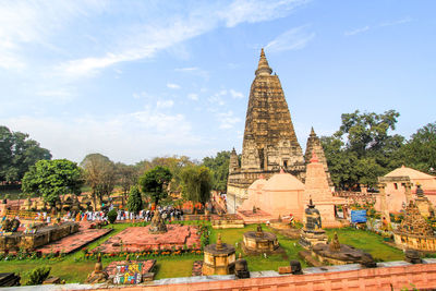 Panoramic view of temple against building