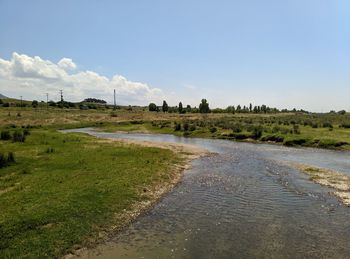 Scenic view of land against sky