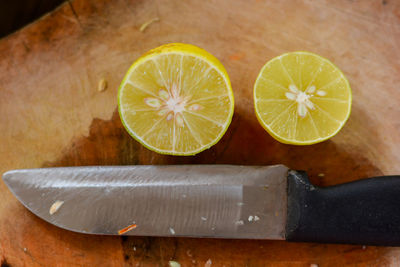 High angle view of lemon slice on cutting board