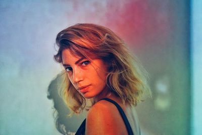 Portrait of young woman looking away