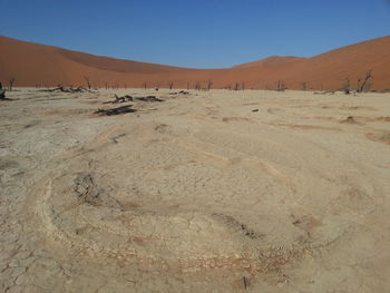 Scenic view of desert against sky