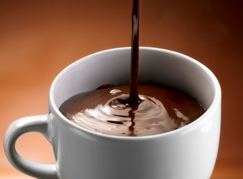 Close-up of coffee cup on table