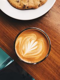 High angle view of cappuccino on table