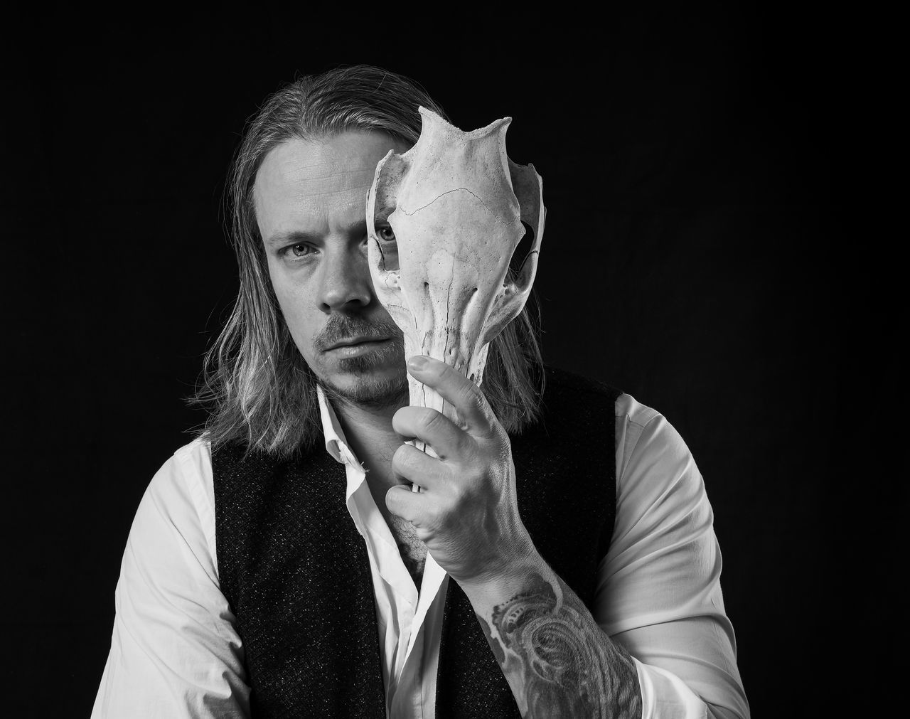 FULL LENGTH PORTRAIT OF MAN HOLDING BLACK BACKGROUND