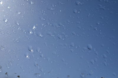 Close-up of snow against sky