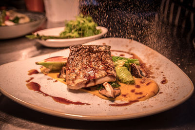 Close-up of food served in plate on table