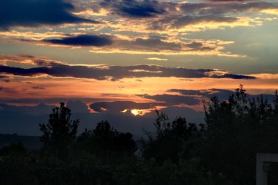 Scenic view of dramatic sky during sunset