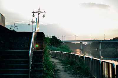 Bridge over canal against sky