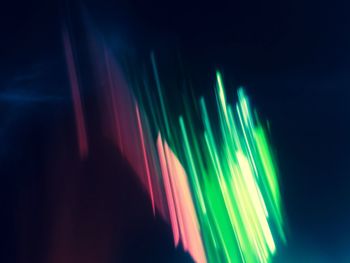Close-up of colorful balloons over white background