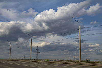 Street against cloudy sky