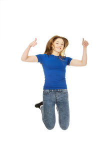 Portrait of smiling young woman against white background