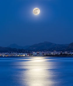 Scenic view of sea against sky at night