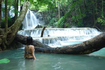 View of waterfall in river