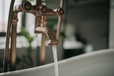 Close-up of rusty handle in sink