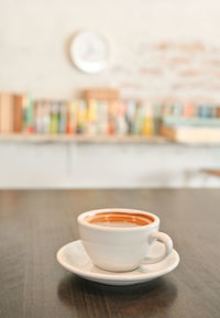Close-up of coffee served on table
