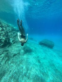 Snorkelling in rhodes, greece. the beauty and freedom of free wild diving and swimming. kalithea.