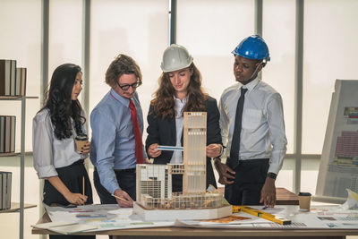 Group of people working on table