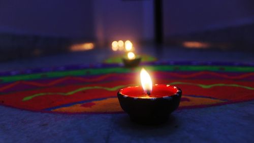 Close-up of illuminated candle