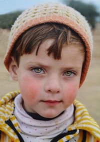 Close-up portrait of cute boy with hazel eyes