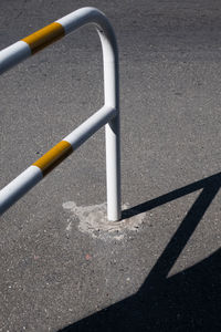 Close-up of pipe on road