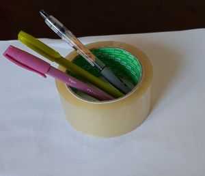 High angle view of various paint on table