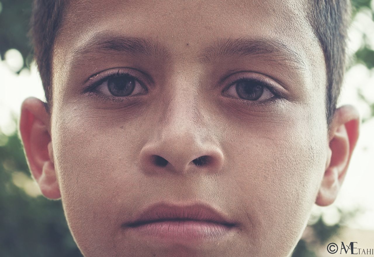 CLOSE-UP PORTRAIT OF A YOUNG WOMAN WITH EYES CLOSED