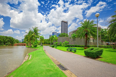 Panoramic view of park against cloudy sky