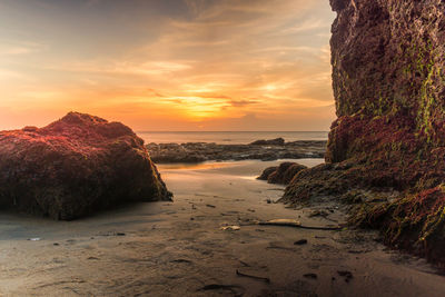 Scenic view of beach during sunset