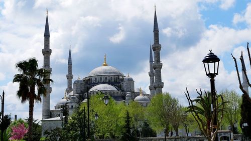 View of cathedral and buildings against sky