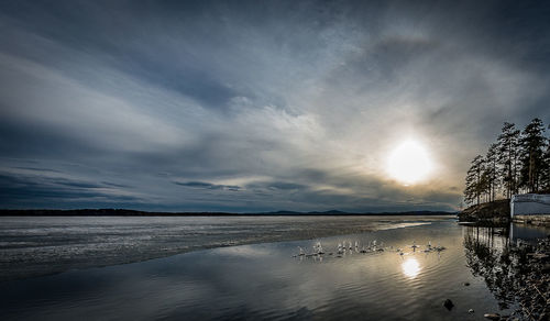 Scenic view of sea against sky during sunset