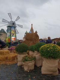 View of traditional windmill against sky